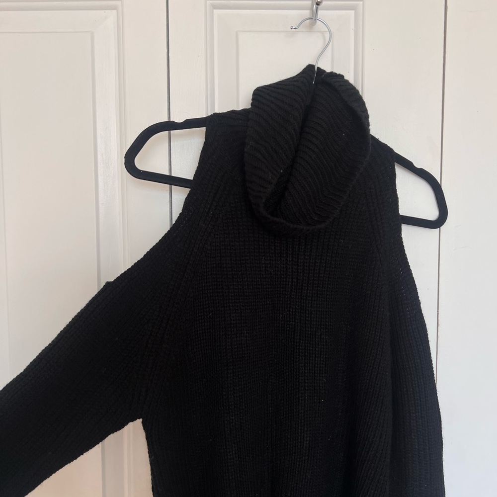 Exposed black sweater dress